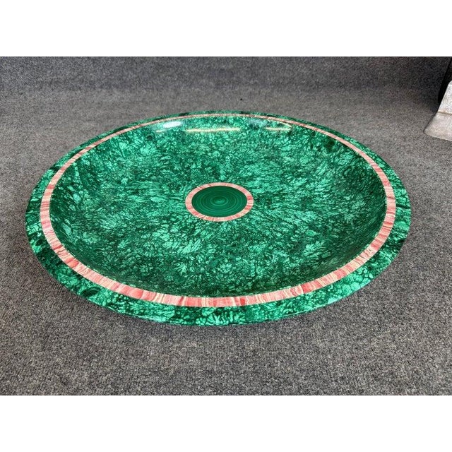 Measures 23 in diameter x 5.25 tall This striking centerpiece is a masterpiece of lapidary art, expertly crafted from...