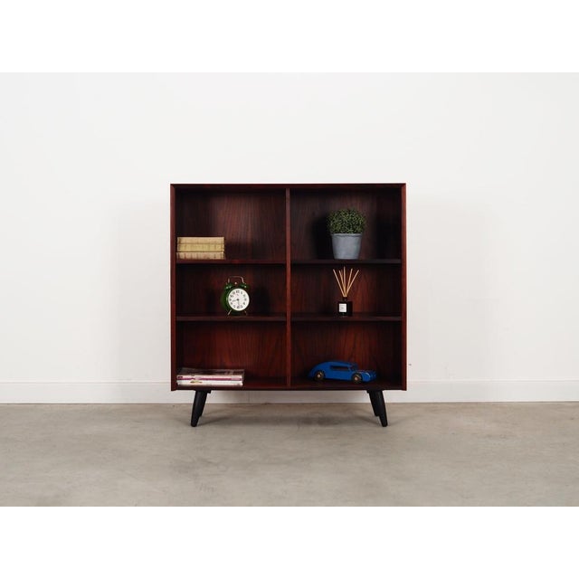 The bookcase was made in the 1970s, produced by the well-known Danish Brouer manufactory. The structure is covered with...