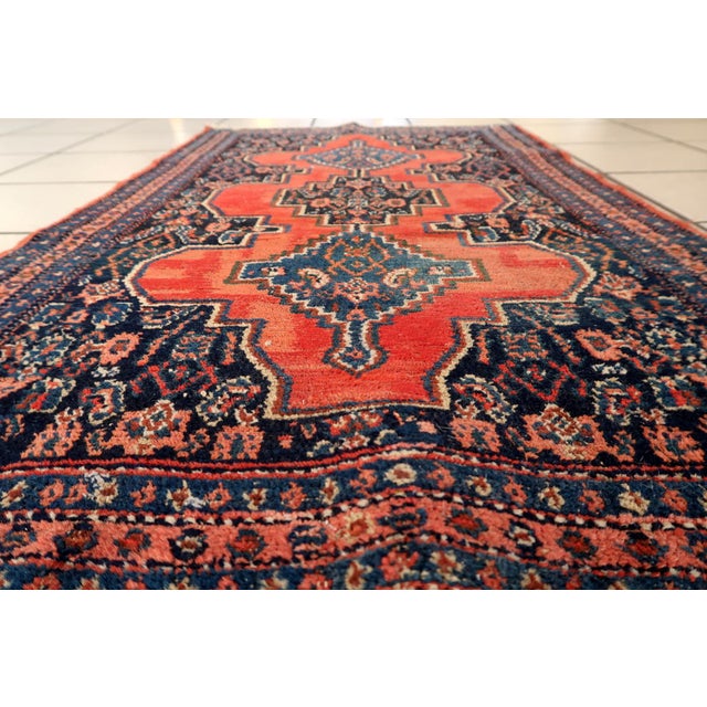 This exquisite antique rug comes from Senneh (modern-day Sanandaj), the capital of the Persian Kurdistan province....