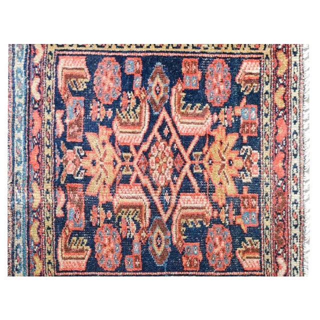 A wonderful early 20th century Persian Malayer bag face with a wonderful tribal pattern containing stylized flowers and...