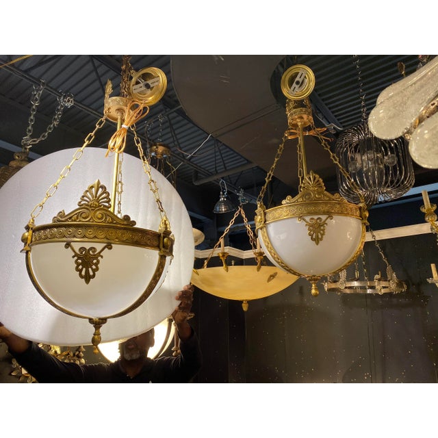 Set of 4 opaline glass light fixtures. Priced each.