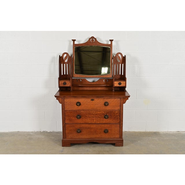 A gorgeous antique Mission, Arts & Crafts, or Art Nouveau period vanity dresser or chest of drawers with mirror Attributed...
