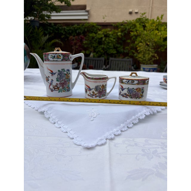 Vintage mid-century Chinese export porcelain 3-piece coffee and tea serving trio featuring the traditional Zhongguo Zhi...