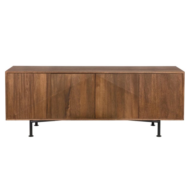 Crafted from a combination of Walnut wood, veneer, and industrial steel, the Lionell Sideboard marries natural beauty with...