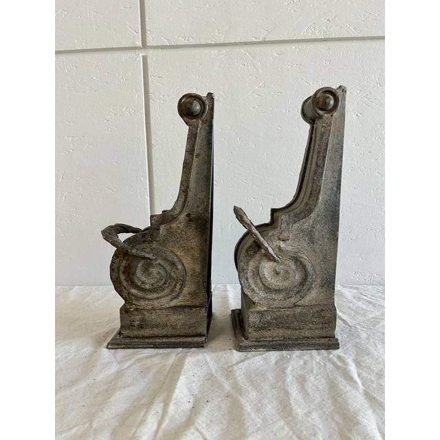 Antique Pair of Architectural Corbel Brackets. Appear to be made of heavy metal featuring a detailed scroll design and...