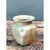 This vintage small pottery vase presents a classic bulbous silhouette, its rounded body swelling generously before...