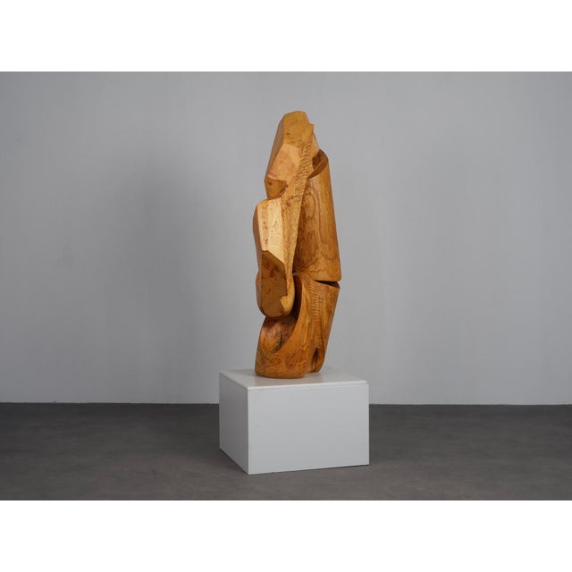 An impressive monumental wooden sculpture titled herbalans by dutch artist joop van bergen, created in the 1980s. Carved...