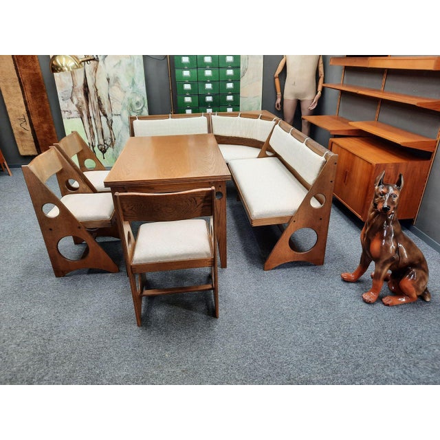 This dining room set by Gilbert Marklund from the 1970s is very rare. It consists of a corner bench, an extendable dining...