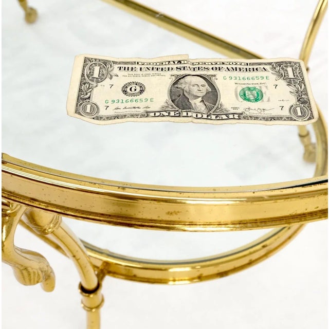 Italian solid brass swan motive oval racetrack shape two tier coffee table mid century.