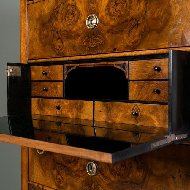 The Biedermeier chest of drawers veneered with walnut is an exceptional 19th-century piece from Austria, distinguished by...