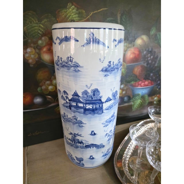 Blue and white Chinoiserie umbrella stand. This classically decorated porcelain umbrella stand brings a touch of class to...