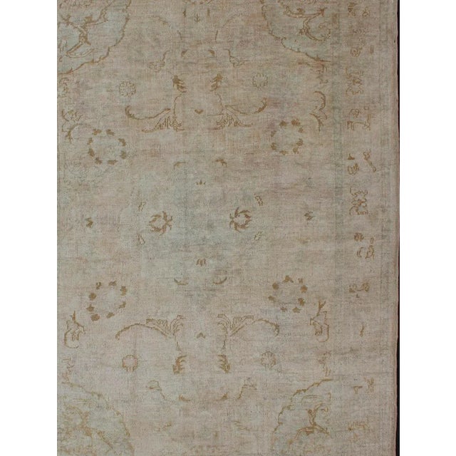 Keivan Woven Arts, Cream background mid century vintage Oushak rug from Turkey with floral design, rug , country of origin...