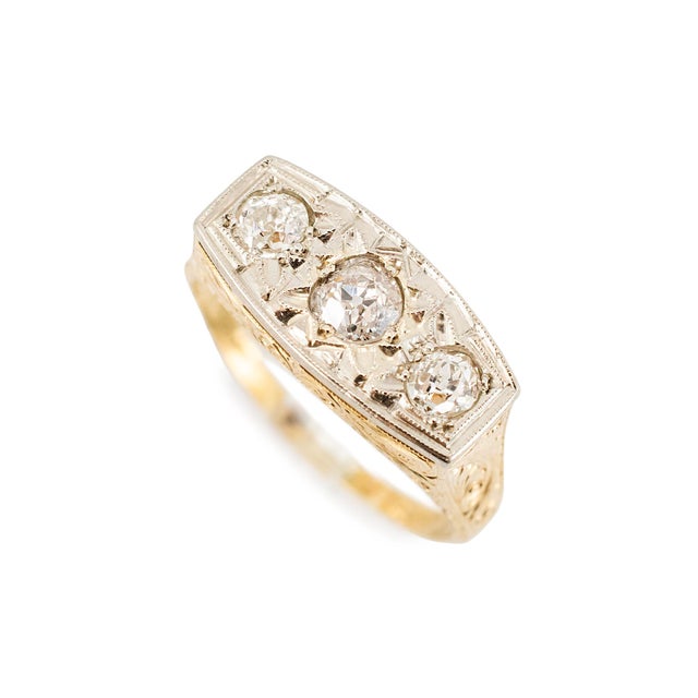 Gender: Ladies Metal Type: 18K & 14K White & Yellow Gold Ring Size: 8 Width: 1.75 mm Weight: 4.62 grams Ladies handmade...