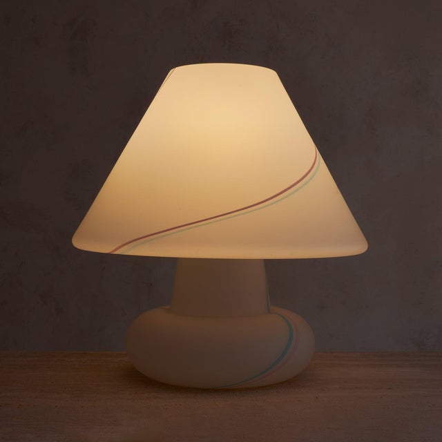 An Italian Murano glass table lamp designed by Vetri in the 1970s. Monumental in scale, the sculptural form is composed of...