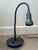 Used vintage lamp in good condition (used bulb included). Holtkotter reading lamp has an adjustable lens that focuses the...