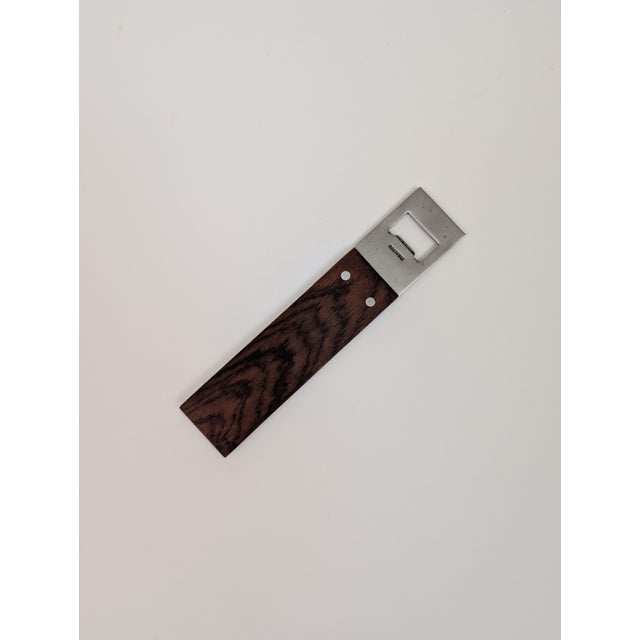 This Danish bottle openers have richly grained rosewood handle. The handle has a maker's mark. Very nice additions to your...