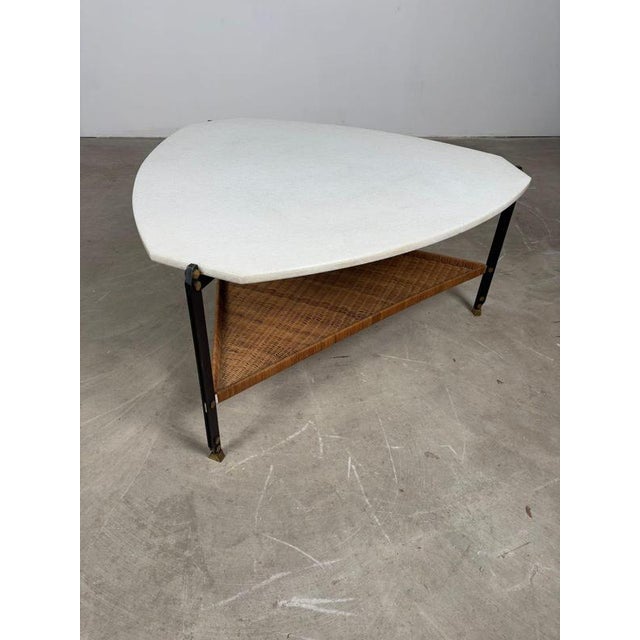 Coffee Table in Granite and Rattan, 1960s coffee table crafted from high-quality materials. The granite (marble) top is...