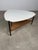 Coffee Table in Granite and Rattan, 1960s coffee table crafted from high-quality materials. The granite (marble) top is...