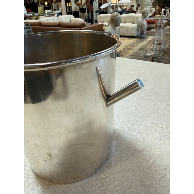 This sleek stainless steel ice bucket is designed for both style and practicality. Featuring a polished finish and sturdy...
