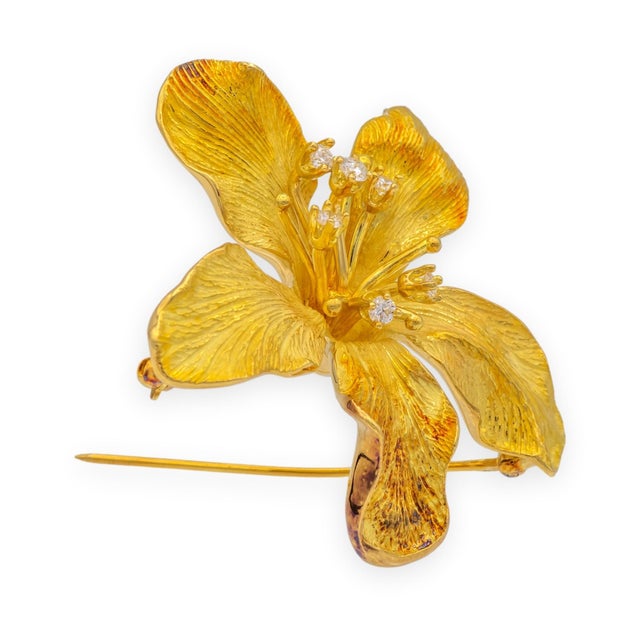 Tiffany & Co. vintage Azalea brooch in 18K yellow gold, featuring five textured petals with finely engraved surface detail...