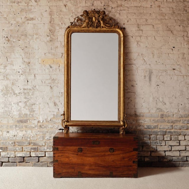 Add timeless elegance and ornate detail to your space with this 19th century French giltwood mirror, a beautifully crafted...