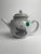 This Chinese export porcelain teapot, decorated in grisaille with a Juno and peacock motif, is a refined example of 18th-...