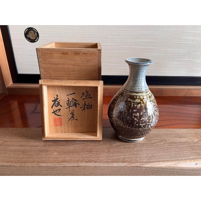Elevate your space with this exquisite stoneware set from the renowned Sakuma Fujitaro Kiln, one of the most historic and...