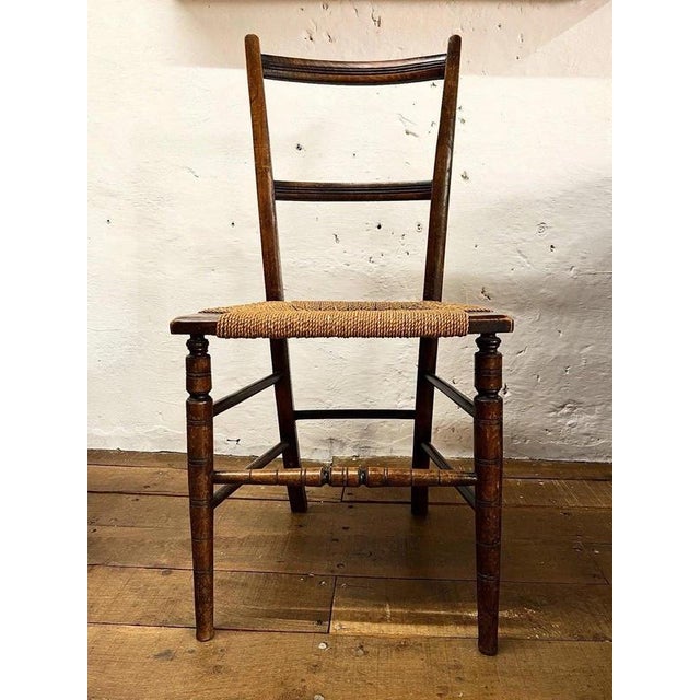 Late 19th Century Walnut Occasional Chair Material: Walnut An elegant late 19th to early 20th century occasional chair,...