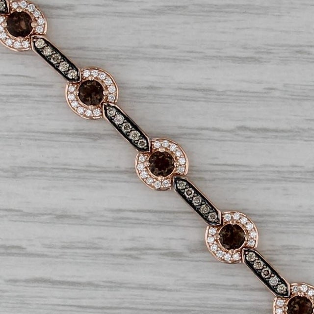 Gemstone Information: - Natural Diamonds - Total Carats - 0.70ctw Cut - Round Brilliant Color - Champagne Brown Clarity -...