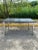 Beautiful sleek and modern 1970s Formica and chrome rectangular dining table. Featuring legs that are adjustable up to an...