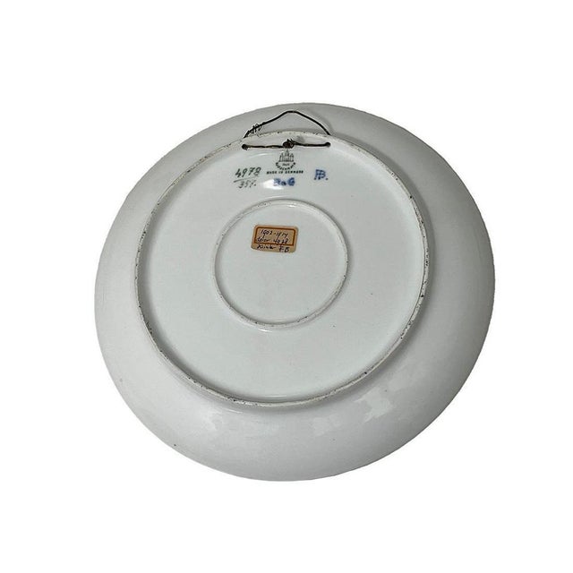 Land with seascape porcelain wall plate by Bing & Grøndahl, Denmark 1902-1914 A land with part of a seascape scene on a...