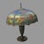 Antique Reverse Painted Glass 8 Panel Table Lamp Landscape 21” Shade 24.5” Description Impressive antique reverse-painted...