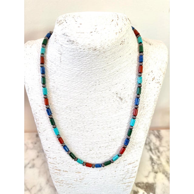 Vintage Sterling Silver, Turquoise, Lapis, Malachite, and Carnelian Beaded Necklace A colorful beaded necklace to add a...