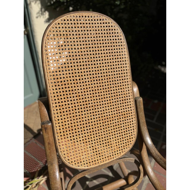 Stunning 1960s vintage Italian Thonet style Art Nouveau bentwood rocking chair made of Walnut. This is and original made...