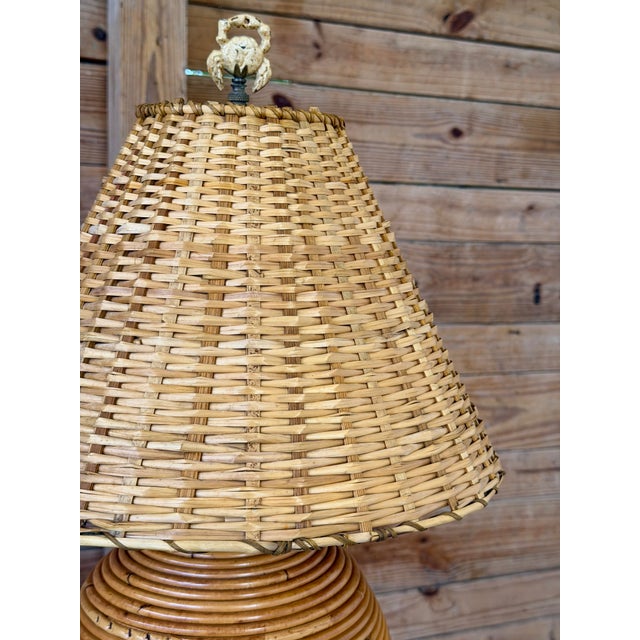 A charming vintage pencil rattan table lamp full of coastal character, complete with its vintage woven rattan lampshade...