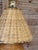 A charming vintage pencil rattan table lamp full of coastal character, complete with its vintage woven rattan lampshade...