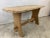 Vintage, organic pine table. 1950’s, purchased in England. We have taken the finish off to expose the natural color and...