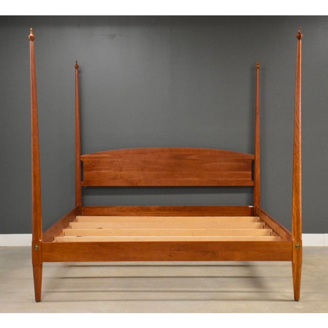 A solid cherry modern king size bed. This bed would go well with mid century modern or shaker style furniture. Clearance...