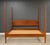 A solid cherry modern king size bed. This bed would go well with mid century modern or shaker style furniture. Clearance...