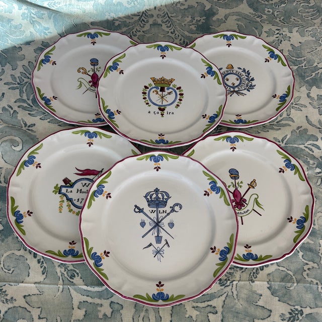 set of six Saint-Amand "A Ca Ira" French Revolution plates. The plates are made of faience or ironstone and are 8 inches...