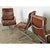 This set of four Soft Pad Executive armchairs by Charles & Ray Eames for Herman Miller are upholstered in original, but...