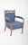 Small chair, upholstered in blue. High backrest, finished with carved wood lace details with plant motifs and an oval...