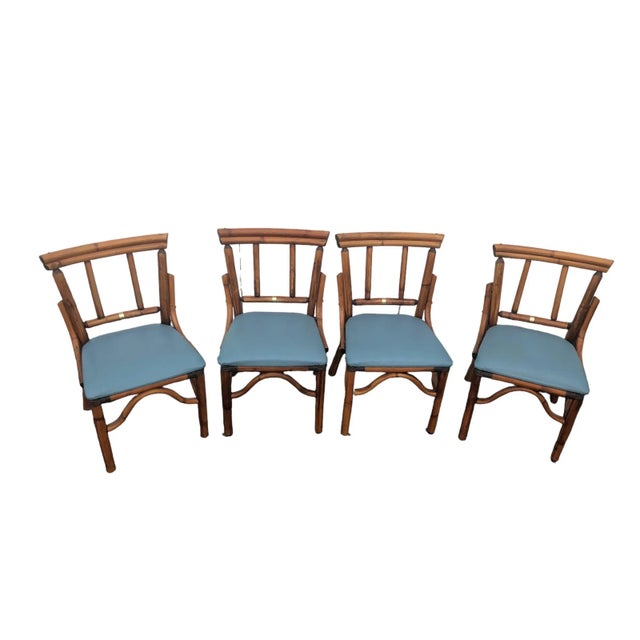 Four Beautiful in the style of Ficks Reed Rattan Accent chairs made for Durability and strength, very clean and sturdy.