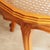 This round coffee table is a piece of furniture in the Louis Philippe style and likely dates from the late 20th century....