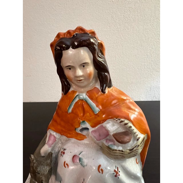 American Antique English Staffordshire Woman With Basket and Dog Figure Circa 1860's For Sale - Image 3 of 12