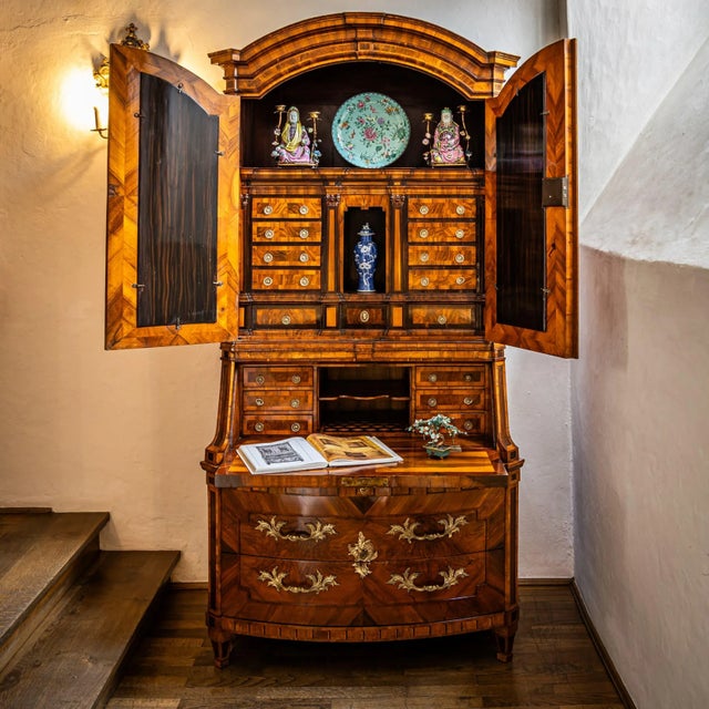 Impressive Baroque secretary from Dresden, featuring a two-drawer, slightly bombé commode base. Above it, a tall slant-...