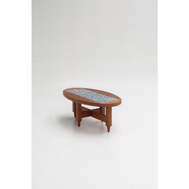 Oval coffee table designed by Guillerme & Chambron for Votre Maison, France, 1960s. The solid oak frame, typical of the...