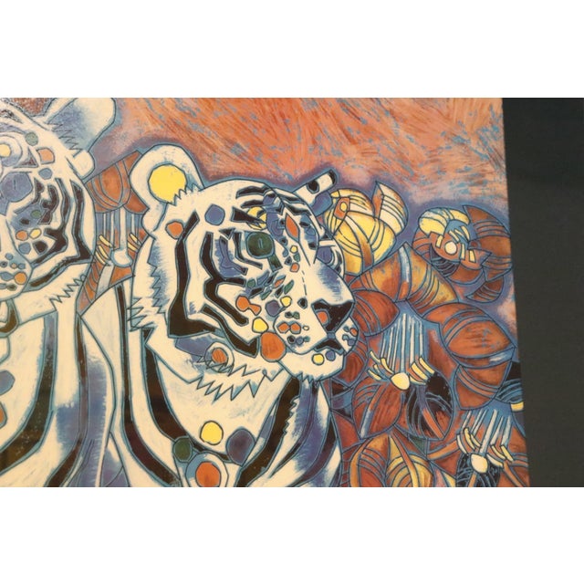 A rich color serigraph titled “White Tigers, 1996”, by Jiang Tiefeng, a Chinese artist b.1938. Two white tigers walk...