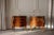 An elegant matching pair of French Louis XV style commode sauté chests of drawers. Features curved bombé shapes,...