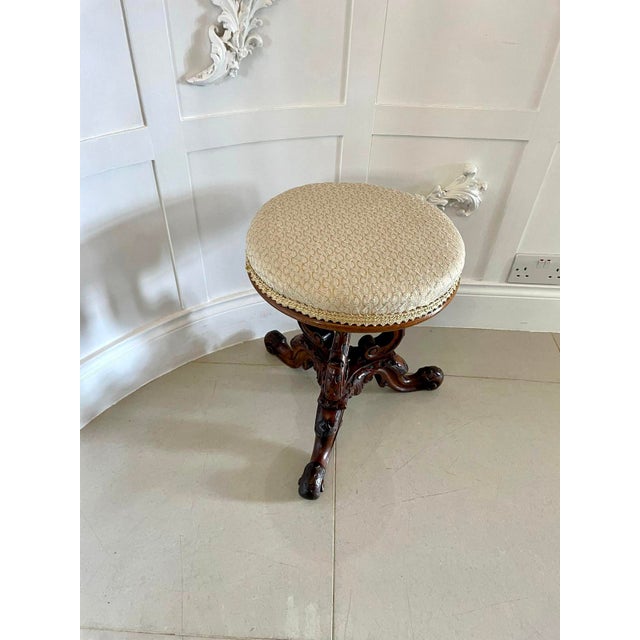 Outstanding quality antique victorian carved walnut stool having a newly reupholstered circular shaped seat in a quality...